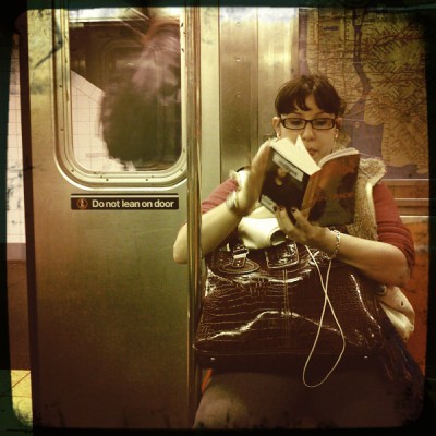 Reader on train - by Bonnie Natko